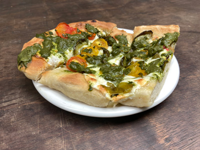 carrot-top-pesto-flatbread-with-roasted-peppers-and-tomatoes