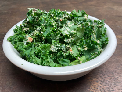 kale-salad-with-creamy-carrot-top-dressing-and-toasted-walnuts