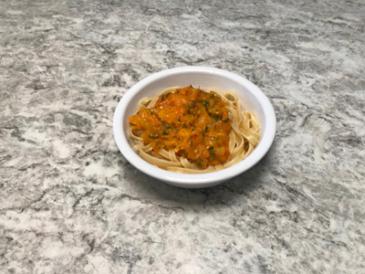 tomato-sage-pine-nut-sauce-over-pasta